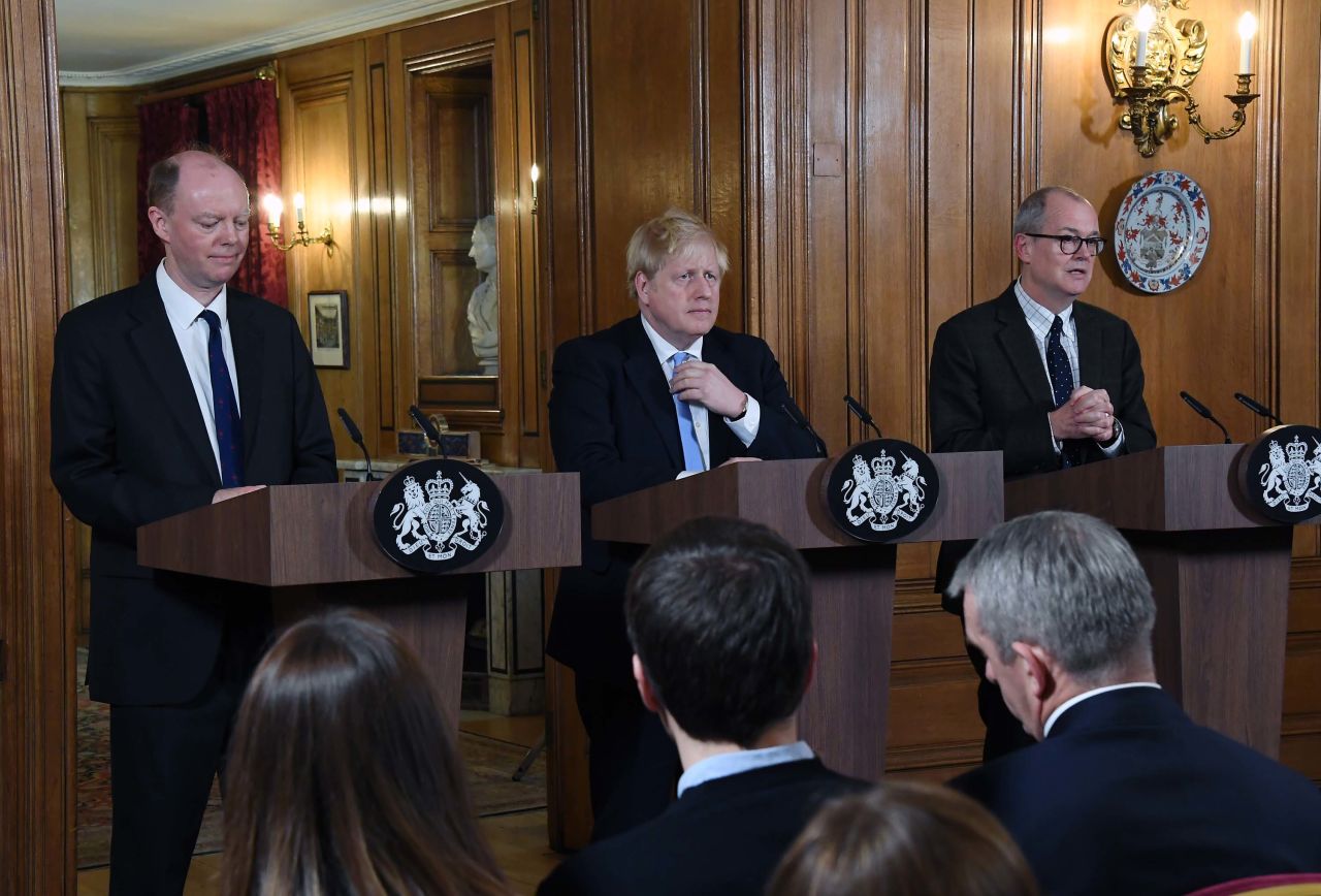 From left: Chief Medical Officer for England Chris Whitty, UK Prime Minister Boris Johnson, and Chief Scientific Adviser Patrick Vallance speak during a press conference in London, England, on March 9.