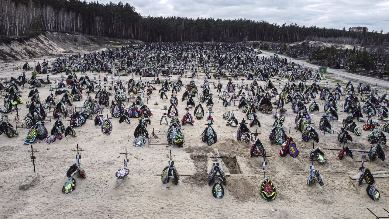 Ukrainian civilians who lost their lives during the Russian invasion are buried in the cemetery in Irpin, Ukraine, on April 18.