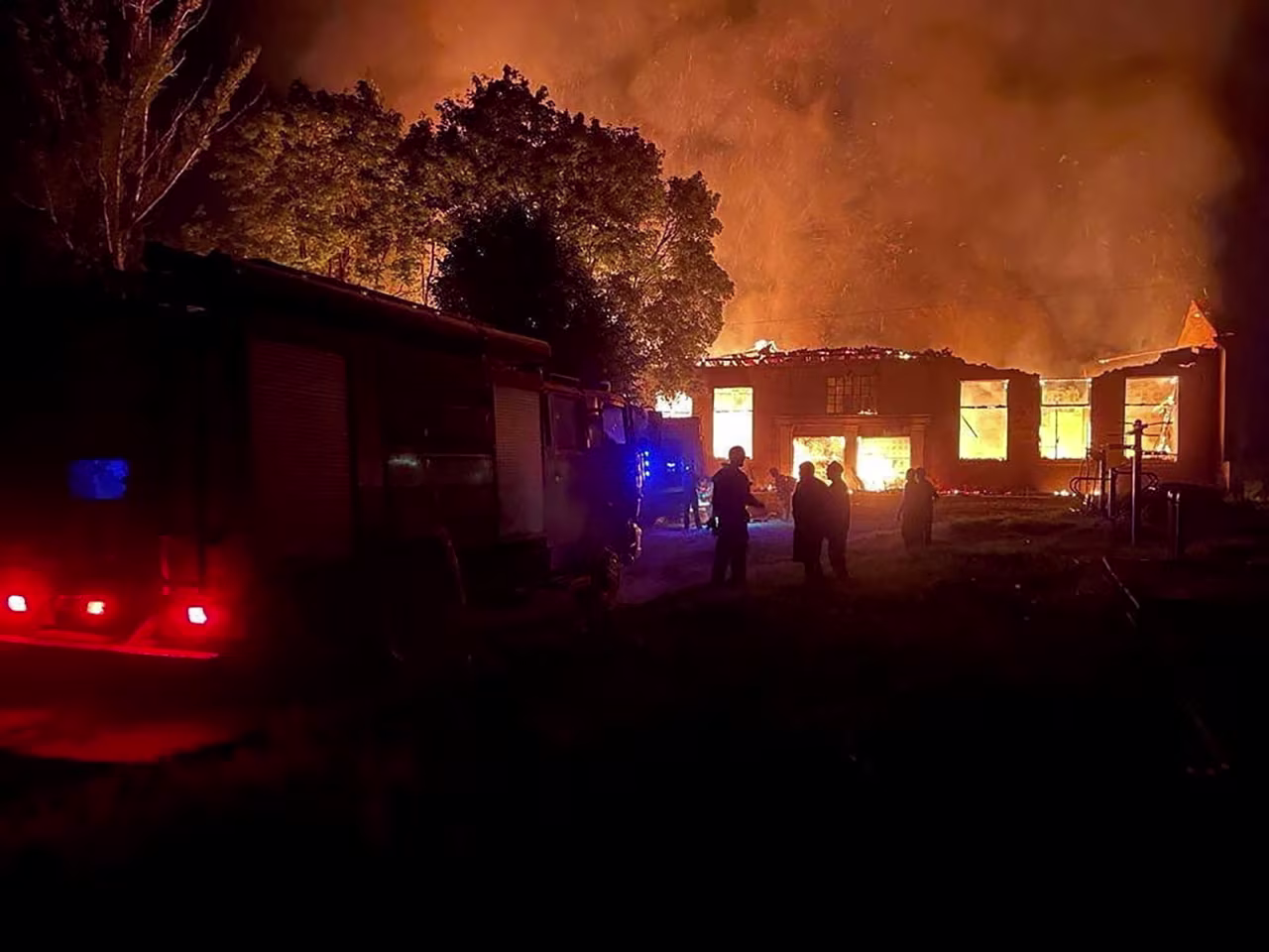 Smoke and flames rise in the town of Kupyansk in eastern Kharkiv, Ukraine, in this image released on August 5, and obtained from the Ukrainian President's Telegram account. 