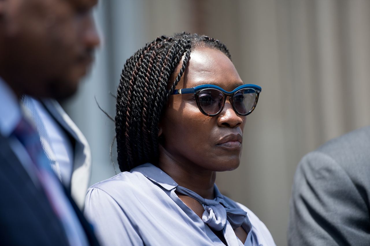 Wanda Cooper-Jones, mother of Ahmaud Arbery, listens as attorneys speak outside the Glynn County Courthouse on July 17, 2020 in Brunswick, Georgia. 