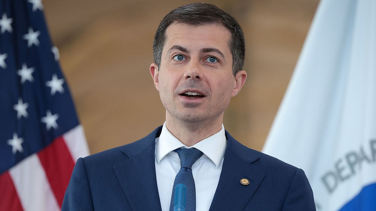 US\ Transportation Secretary Pete Buttigieg speaks during a news conference at Washington National Airport on April 24, in Arlington, Virginia. 