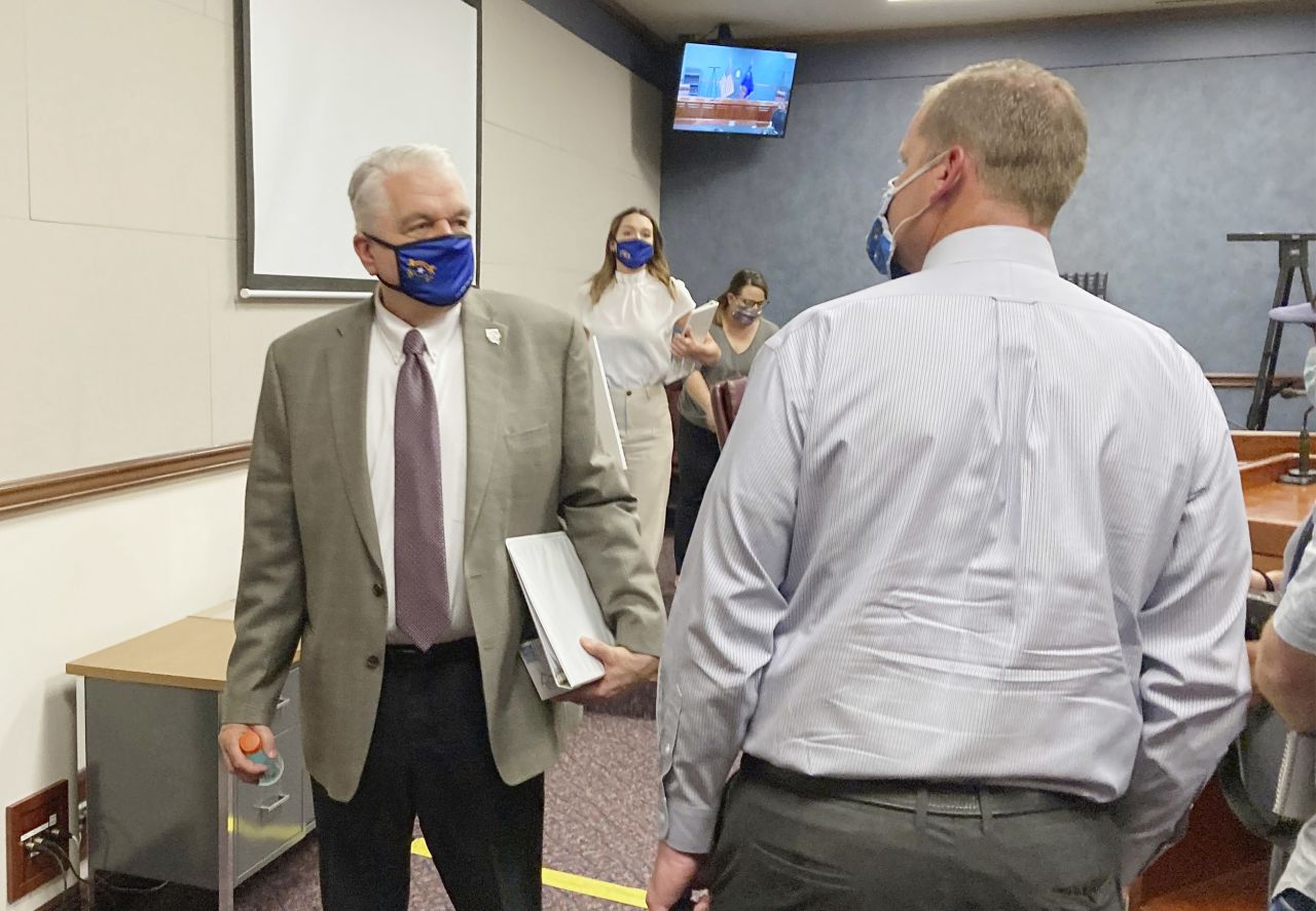 Gov. Steve Sisolak exits a news conference at the Nevada State Legislature in Carson City, Nevada on Wednesday, June 24. 