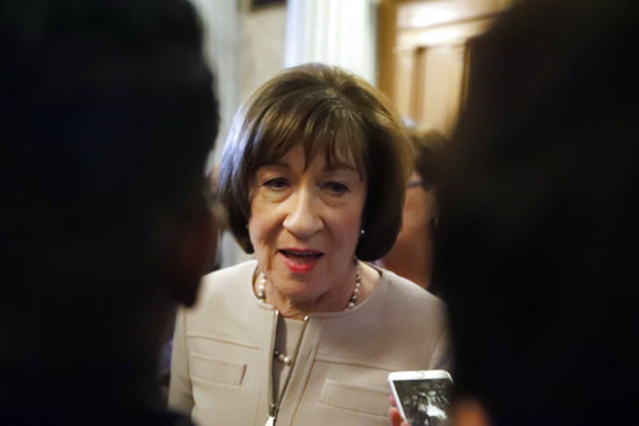 Sen. Susan Collins, R-Maine, talks with reporters after speaking on the Senate floor, on Capitol Hill, Friday, on Oct. 5, 2018 in Washington about her vote on Supreme Court nominee Judge Brett Kavanaugh. 