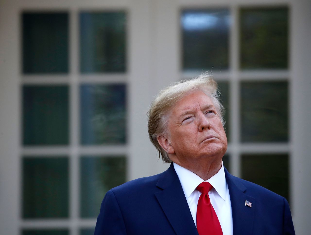 President Donald Trump attends a briefing about the coronavirus in the Rose Garden of the White House on March 30.