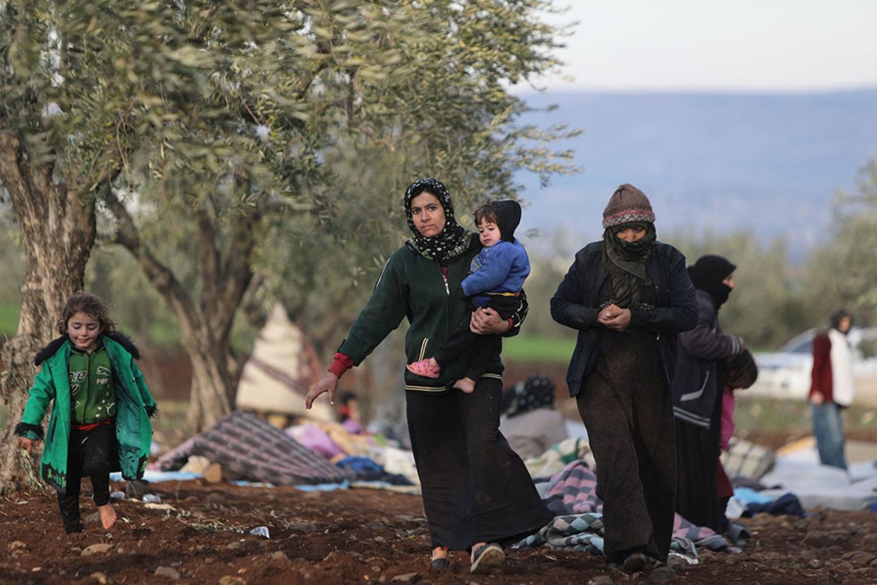 Displaced Syrians take shelter on the outskirts of the rebel-held town of Jindayris on February 8.