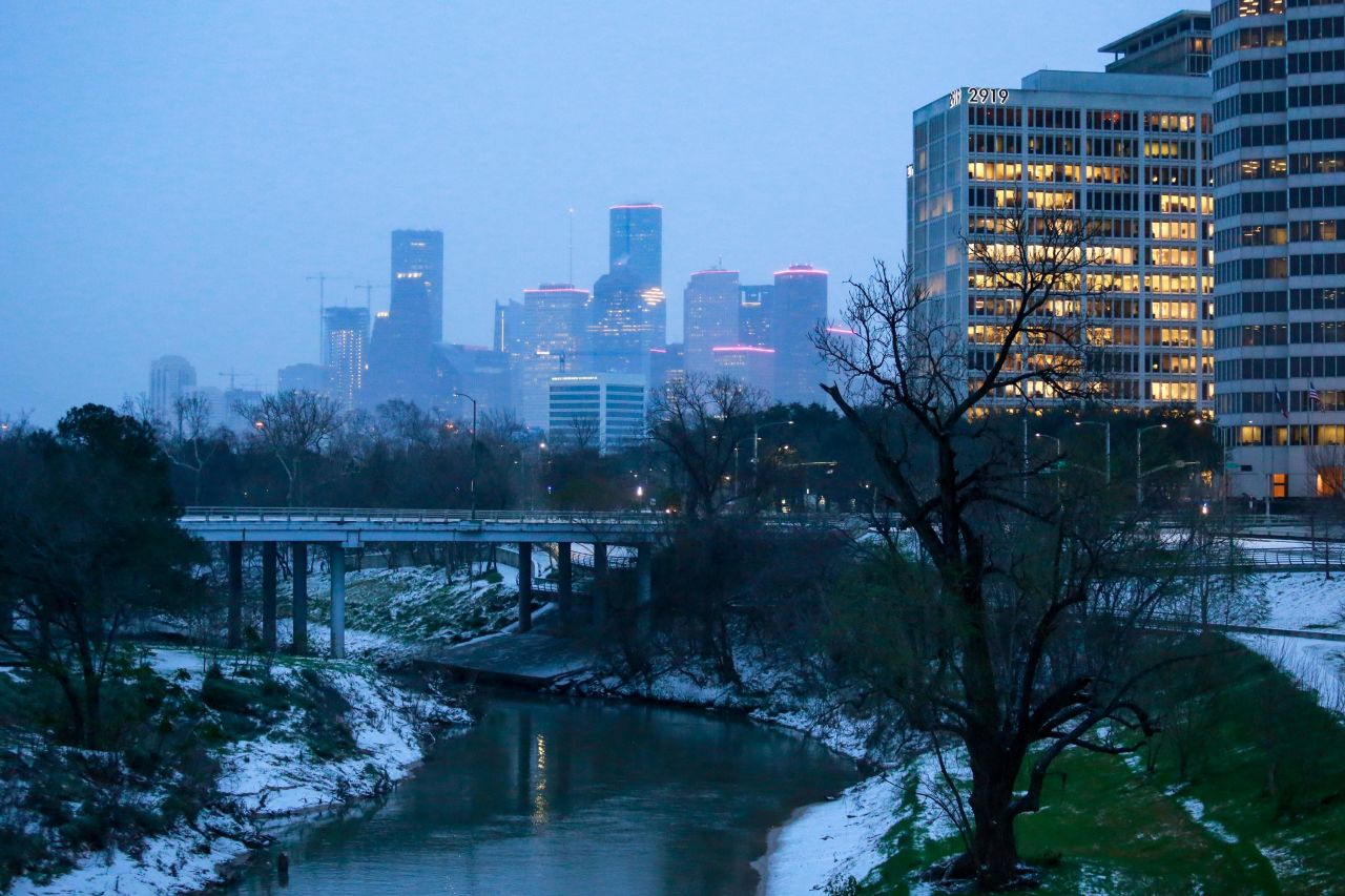 The Houston skyline seen from Buffalo Bayou Park early on the morning of Monday, February 15, after the snow storm.