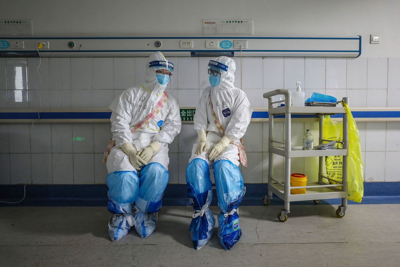 Medical staff members chat at the Wuhan Red Cross Hospital in Wuhan in China's central Hubei province on Sunday, February 16.