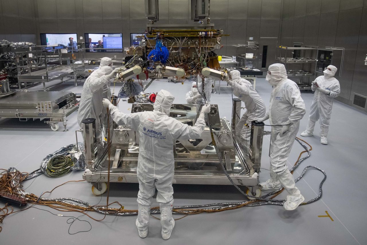 Workers prepare the European Space Agency's ExoMars rover at an Airbus facility in Stevenage, England, in August 2019.