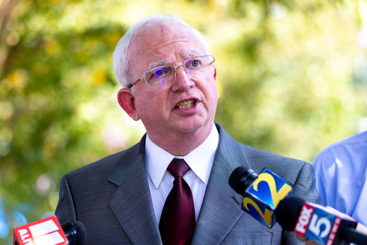 John Eastman makes a statement to press outside the Fulton County Jail in Atlanta on Tuesday.