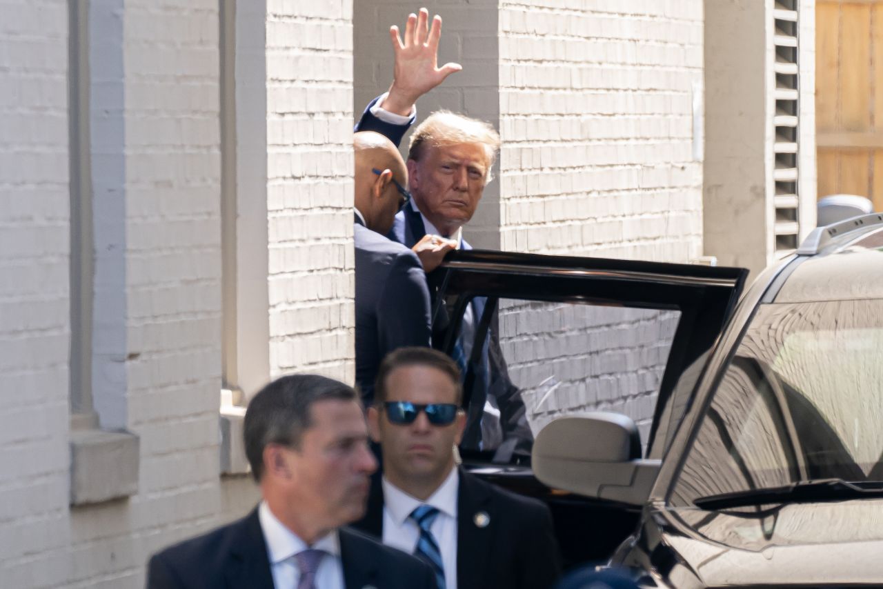 Former President Donald Trump departs after delivering remarks at a House Republicans Conference meeting at the Capitol Hill Club on Thursday.