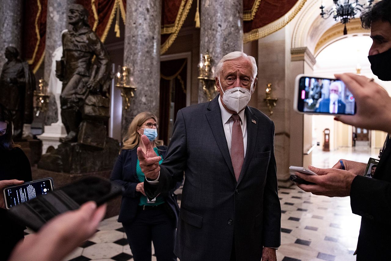 House Majority Leader Steny Hoyer walks out of the House Chamber and talks to reporters at the US Capitol on Wednesday, December 16.