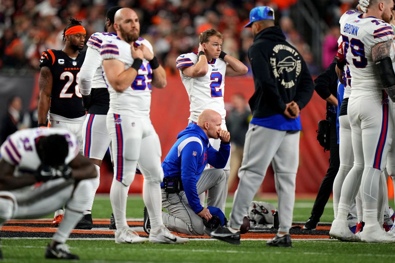 Buffalo Bills head coach Sean McDermott takes a knee as Buffalo Bills safety?Damar?Hamlin?is tended to on the field following a collision in the first quarter against the Cincinnati Bengals at Paycor Stadium on January 2 in Cincinnati, Ohio.