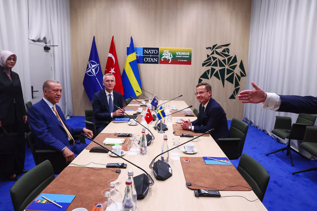 From left, Turkish Recep Tayyip Erdogan, NATO Secretary General Jens Stoltenberg and Swedish Prime Minister Ulf Kristersson meet in Vilnius, Lithuania, on Monday, July 10.