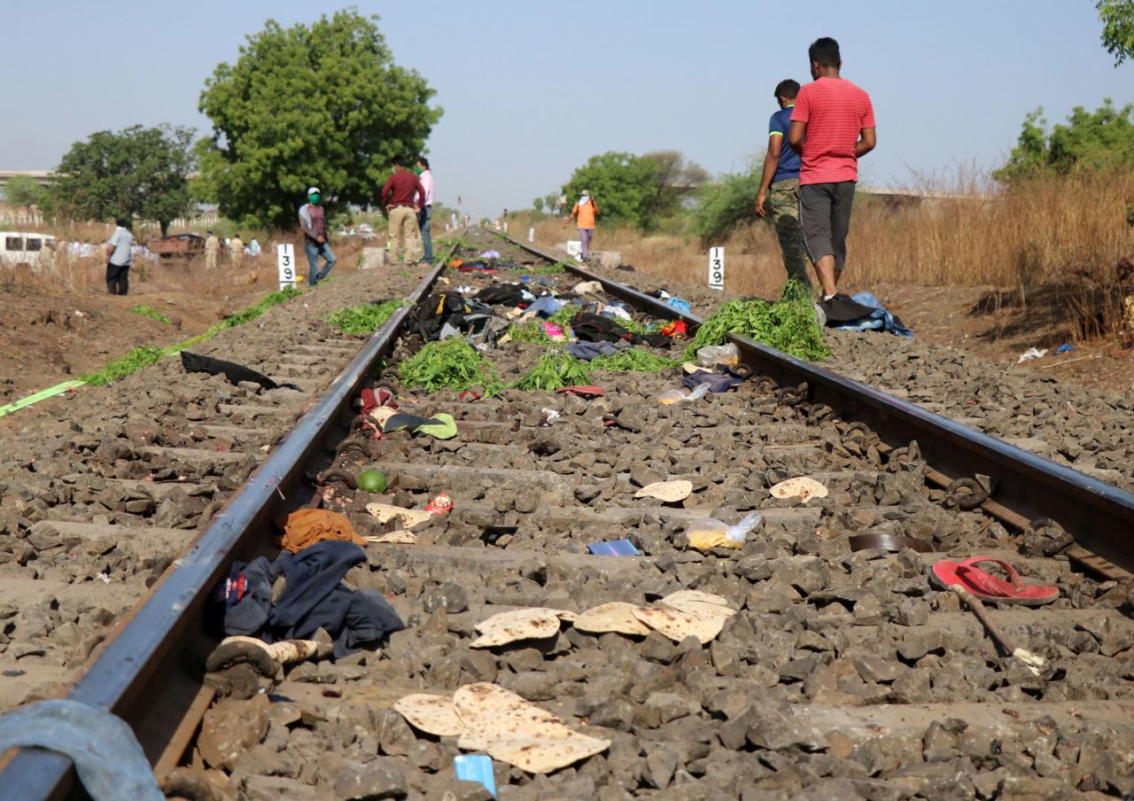 The belongings of victims are scattered on the railway track after a train ran over migrant workers sleeping in the Aurangabad district of Maharashtra, India, on May 8.