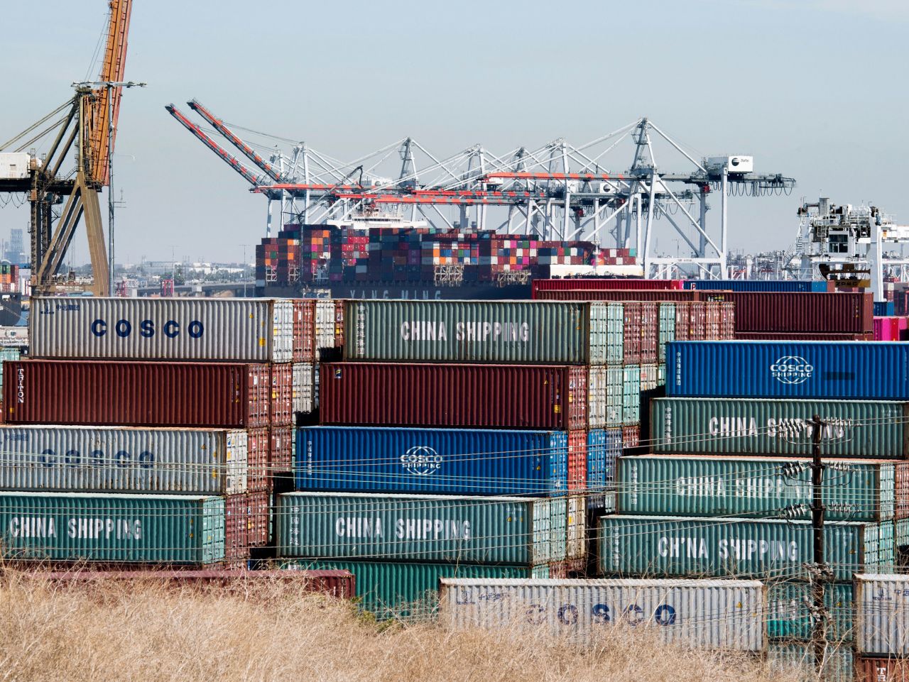 Shipping containers from China and other Asian countries are unloaded at the Port of Los Angeles as the trade war continues between China and the US, in Long Beach, California on September 14, 2019.