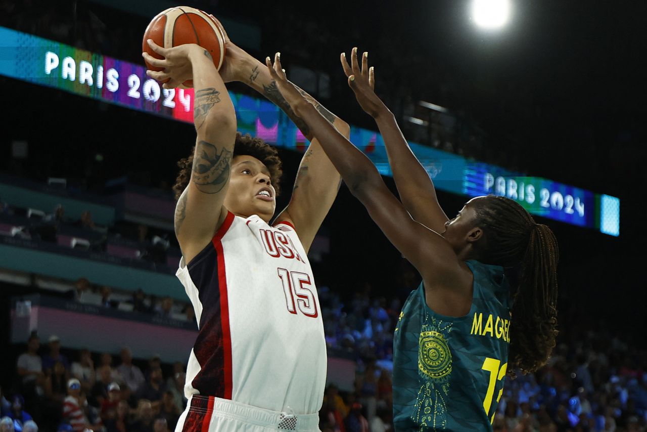 Brittney Griner of the United States shoots as Ezi Magbegor of Australia defends on Friday.