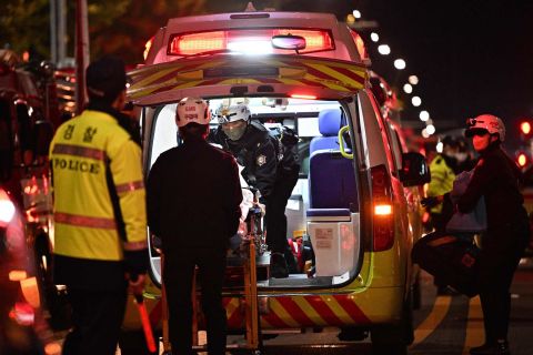 Rescue officials load a stretcher into an ambulance in Itaewon on Saturday night.