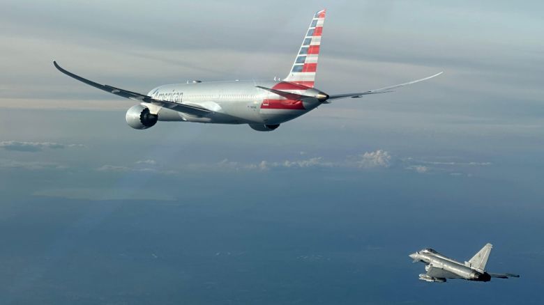 An Italian Air Force photo shows a jet escorting an American Airlines plane to Rome on Sunday, February 23, 2025.