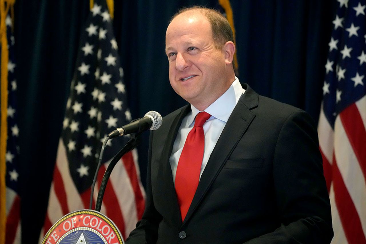 Polis speaks during a news conference on Tuesday, November 1.