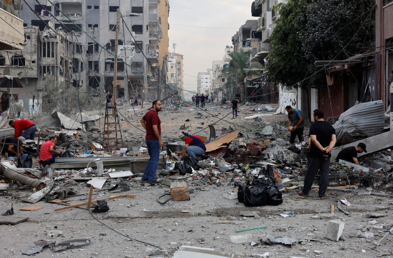 Palestinians inspect damage in the aftermath of Israeli strikes in northern?Gaza on Wednesday.