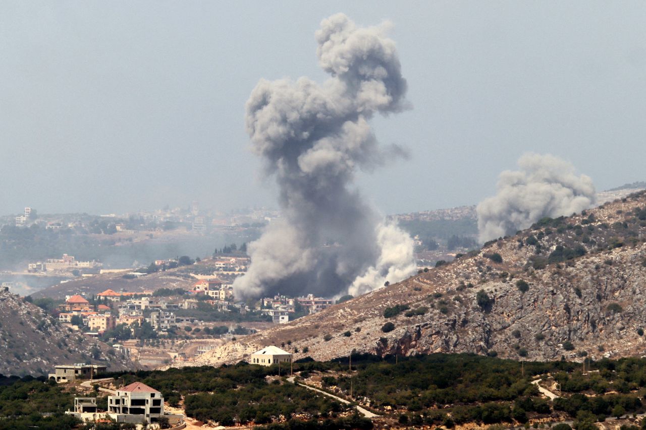 Smoke billows from a site targeted by Israeli shelling in the southern Lebanese village of Khiam on September 23.