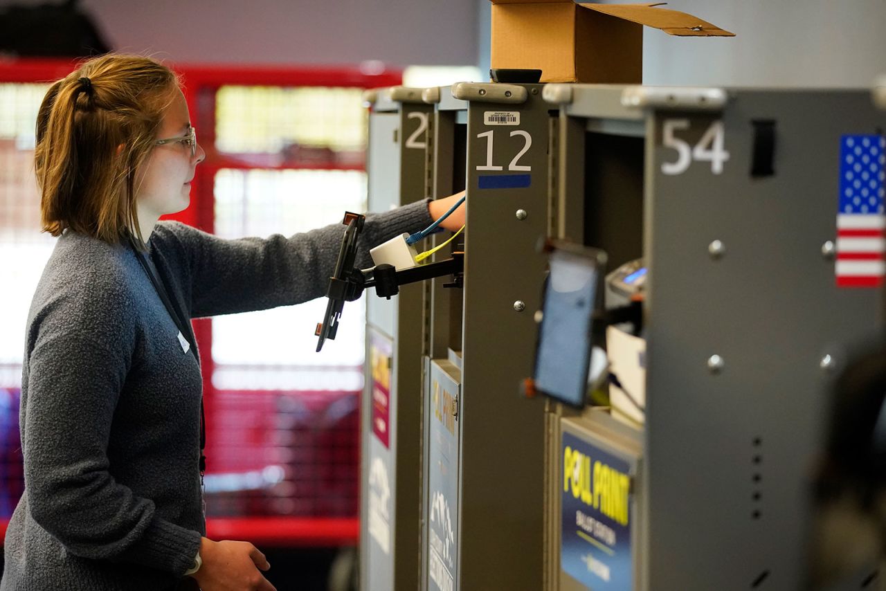 An election worker prints a ballot out for a voter on November 8, in Provo, Utah.