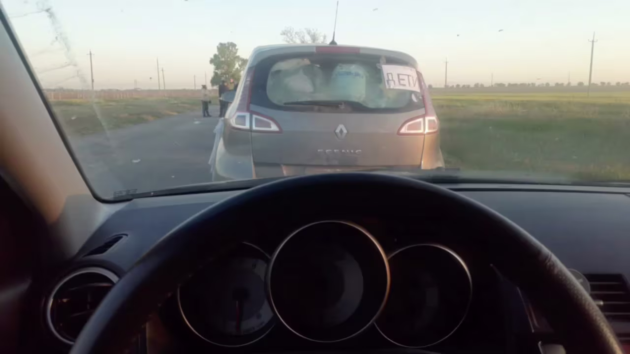 Yulia Bondarenko travels in a convoy of drivers trying to leave Kherson, Ukraine. 