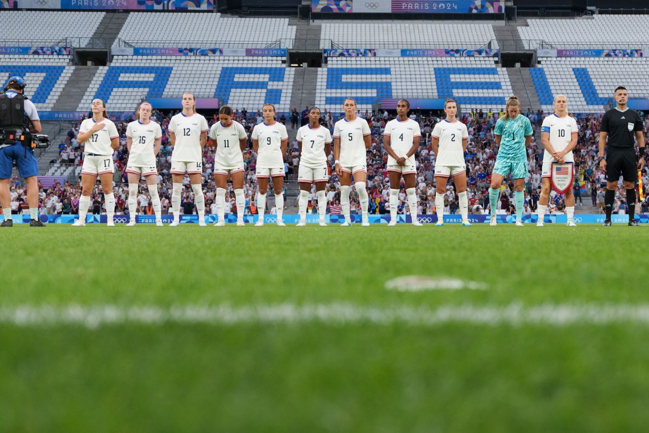 The USNWT starting eleven lines up prior to a match against Germany at Stade de Marseille on July 28.