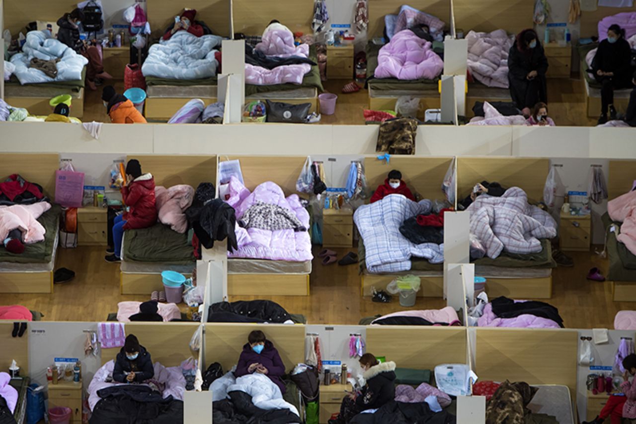 Coronavirus patients rest at a temporary hospital converted from a sports center in Wuhan, Hubei province on Monday, February 17.