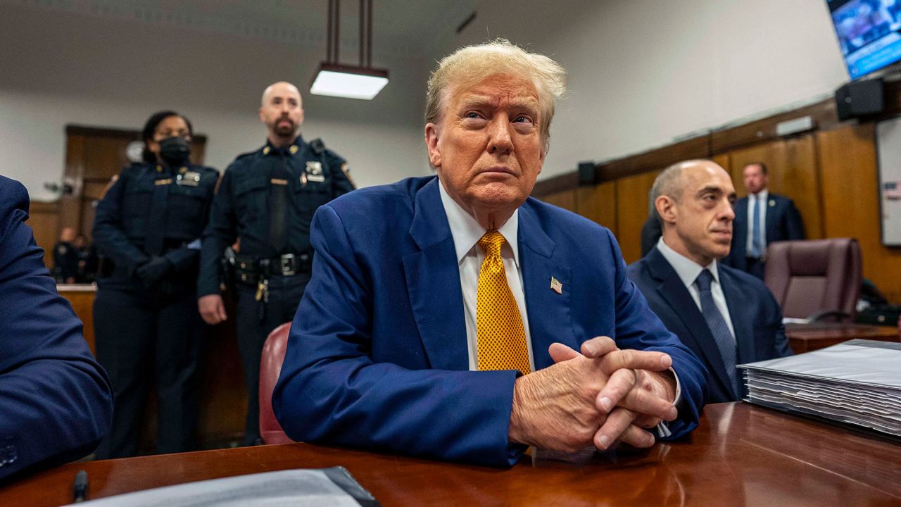Former President Donald Trump attends his trial for allegedly covering up hush money payments at Manhattan Criminal Court in New York on Thursday, May 2. 