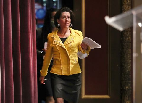 Rhode Island Governor Gina M. Raimondo arrives for a news conference on May 12.