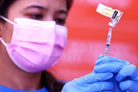 A nurse prepares a dose of the Pfizer Covid-19 vaccine on July 29 in Wilmington, California.