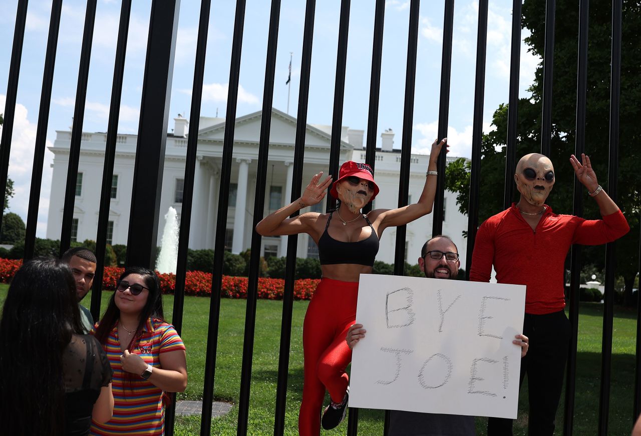 A person holds a sign that reads "Bye Joe!" after President Joe Biden announced he dropped out of the race for re-election, outside of the White House on July 21, in Washington, DC.