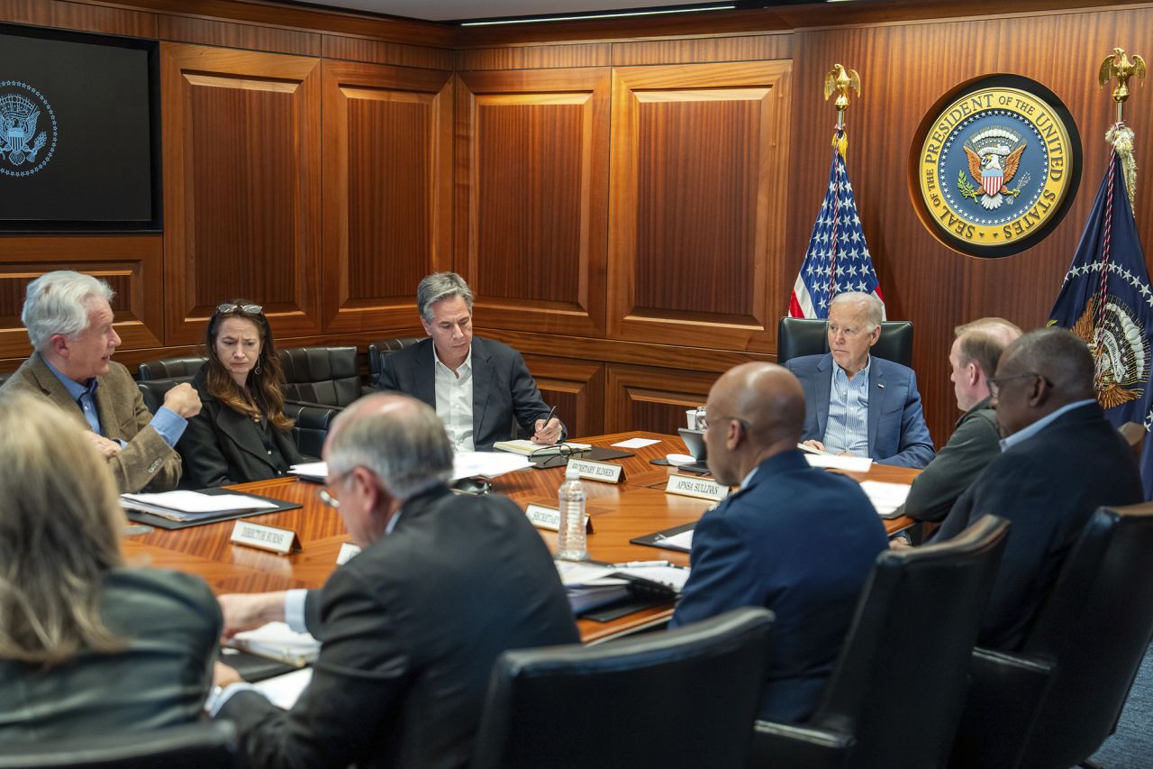 President Joe Biden meets with members of the National Security team regarding the unfolding missile attacks on Israel from Iran on Saturday evening in the White House Situation Room. Some portions of this handout photo have been blurred by the source.