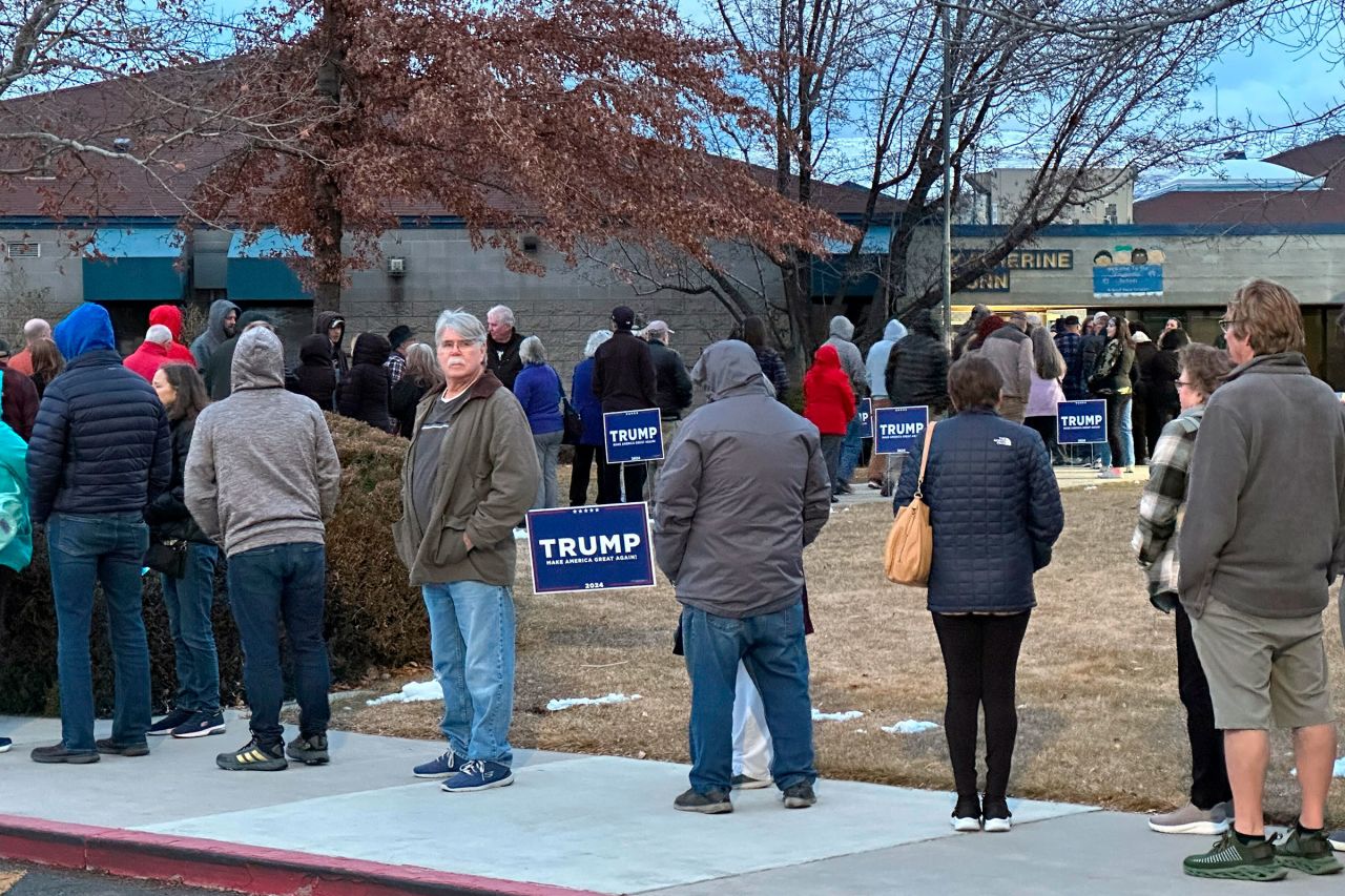 People wait in line to enter a caucus site at Katherine Dunn Elementary School in Sparks, Nevada, on February 8. 