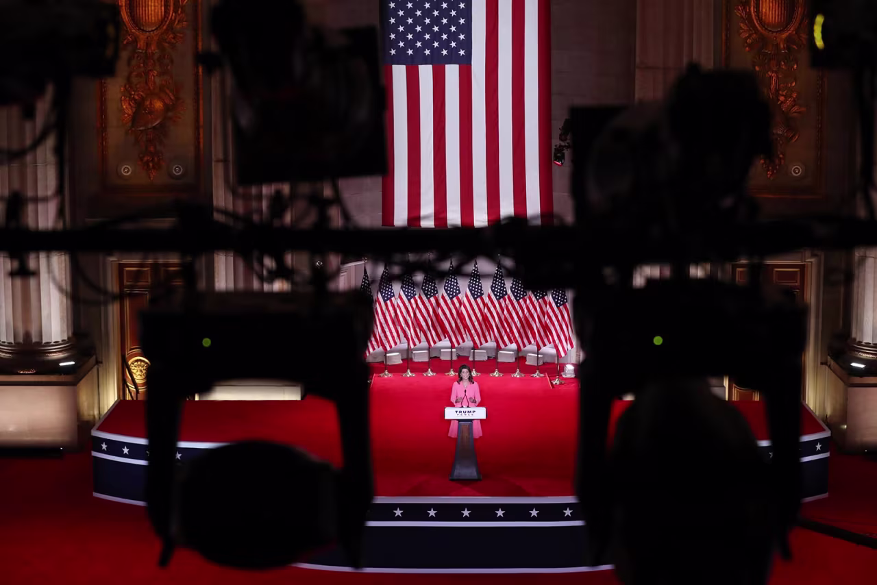 Former U.S. Ambassador to the United Nations Nikki Haley stands on stage in an empty Mellon Auditorium while addressing the Republican National Convention on Monday in Washington.