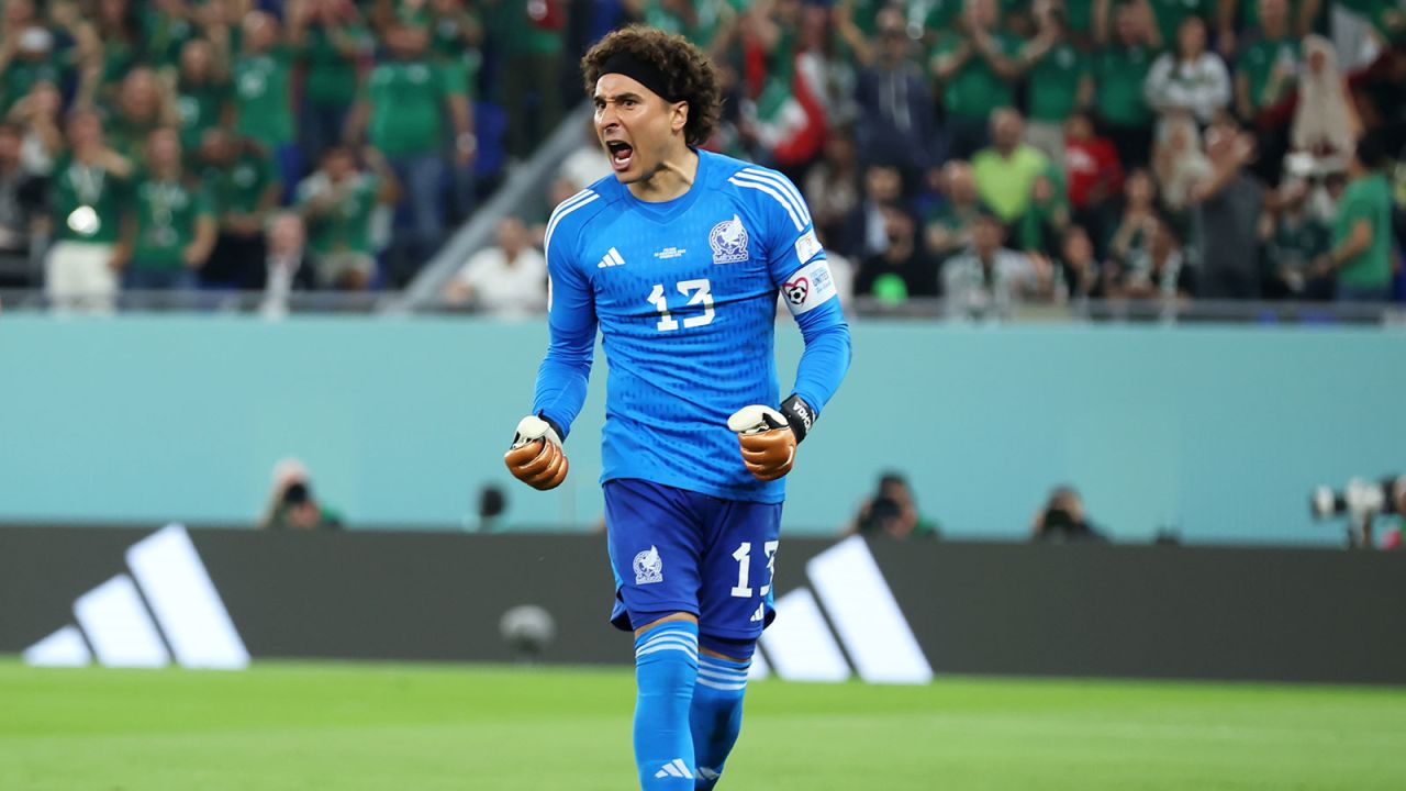 Mexico's Guillermo Ochoa  reacts after saving a penalty shot?during the match against Poland on November 22.