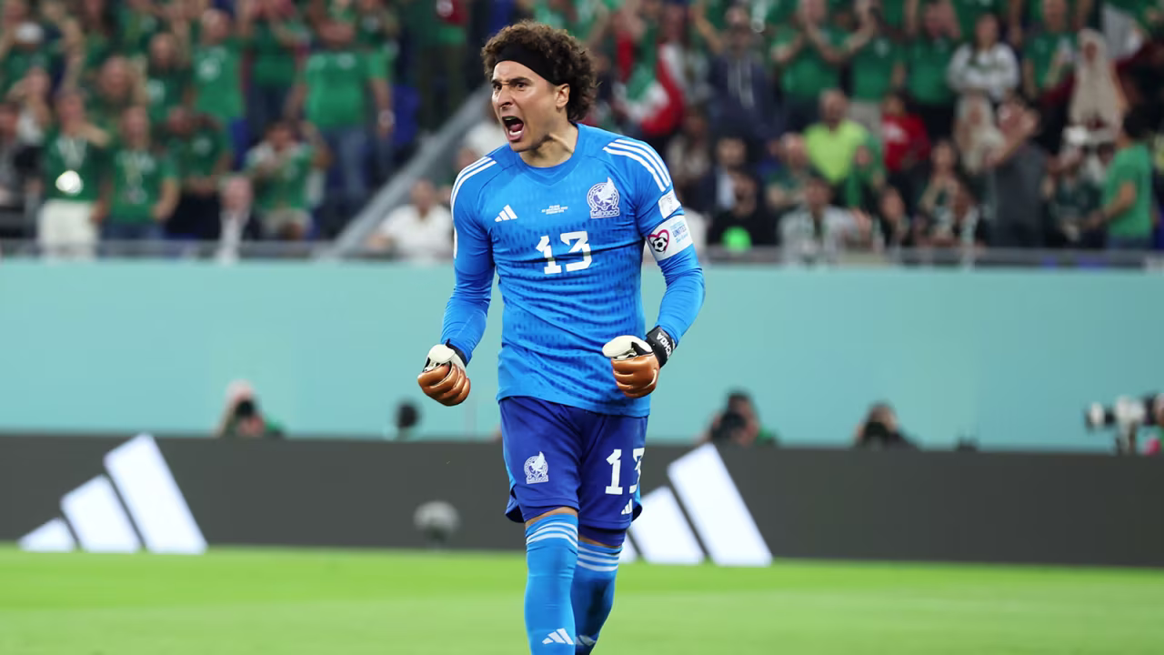 Mexico's Guillermo Ochoa  reacts after saving a penalty shot during the match against Poland on November 22.