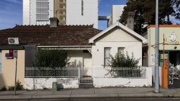 As part of the <a href="https://www.burwood.nsw.gov.au/For-Residents/Events-and-Activities/150-Years-of-Burwood" target="_blank">150 Years of Burwood Program</a>, Council commissioned artist <a href="https://www.instagram.com/claire_foxton/?hl=en" target="_blank">Claire Foxton</a> to create a mural dedicated to Angus and Malcolm Young from Australian rock band AC/DC. Located on the side of 12 Burleigh Street, the mural is just a few seconds walk from the original Young family home at 4 Burleigh Street Burwood. The Young family moved to Burwood in the 1960's from Scotland and attended both Burwood Public Primary School and Ashfield Boys High School.<br />Designed directly in consultation with the Young family, the mural is based on a photo of the band from the 1970's by photographer Phillip Morris in the early days of the band's formation. The blurred background in the design is also in reference to the original facade of 4 Burleigh Street.