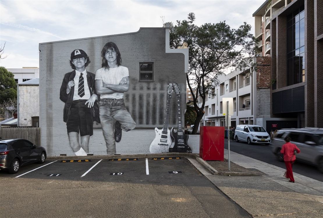 Burwood Council commissioned artist Claire Foxton to create a mural dedicated to Angus and Malcolm Young on the side of 12 Burleigh Street, just a few seconds' walk from the original Young family home.