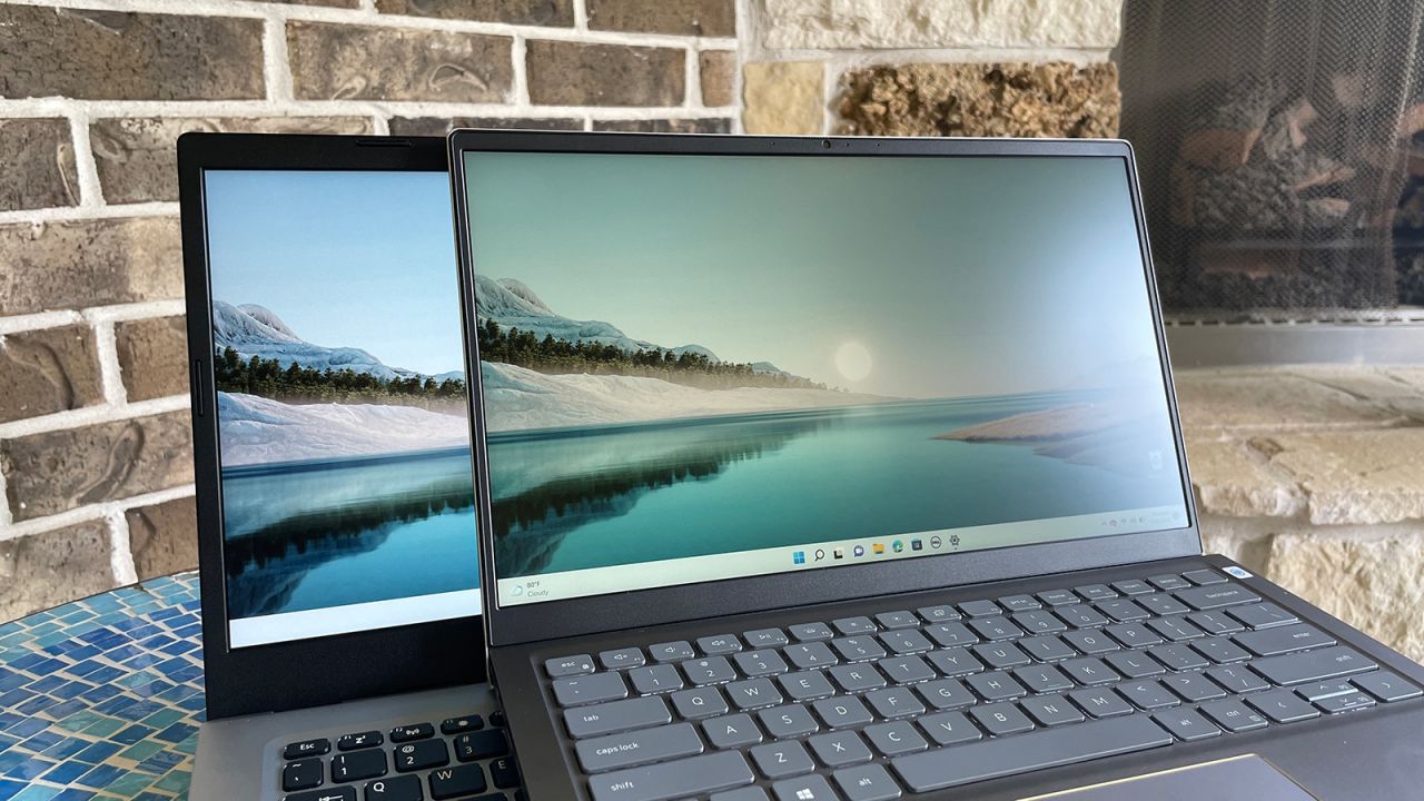 The brighter screen on the Acer Aspire 5 (rear) makes it easier to use than the Dell Inspiron 14 (front) in brightly-lit environments, such as outdoors.