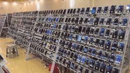 Phone farm in evidence in case of crypto 'pig farming.'