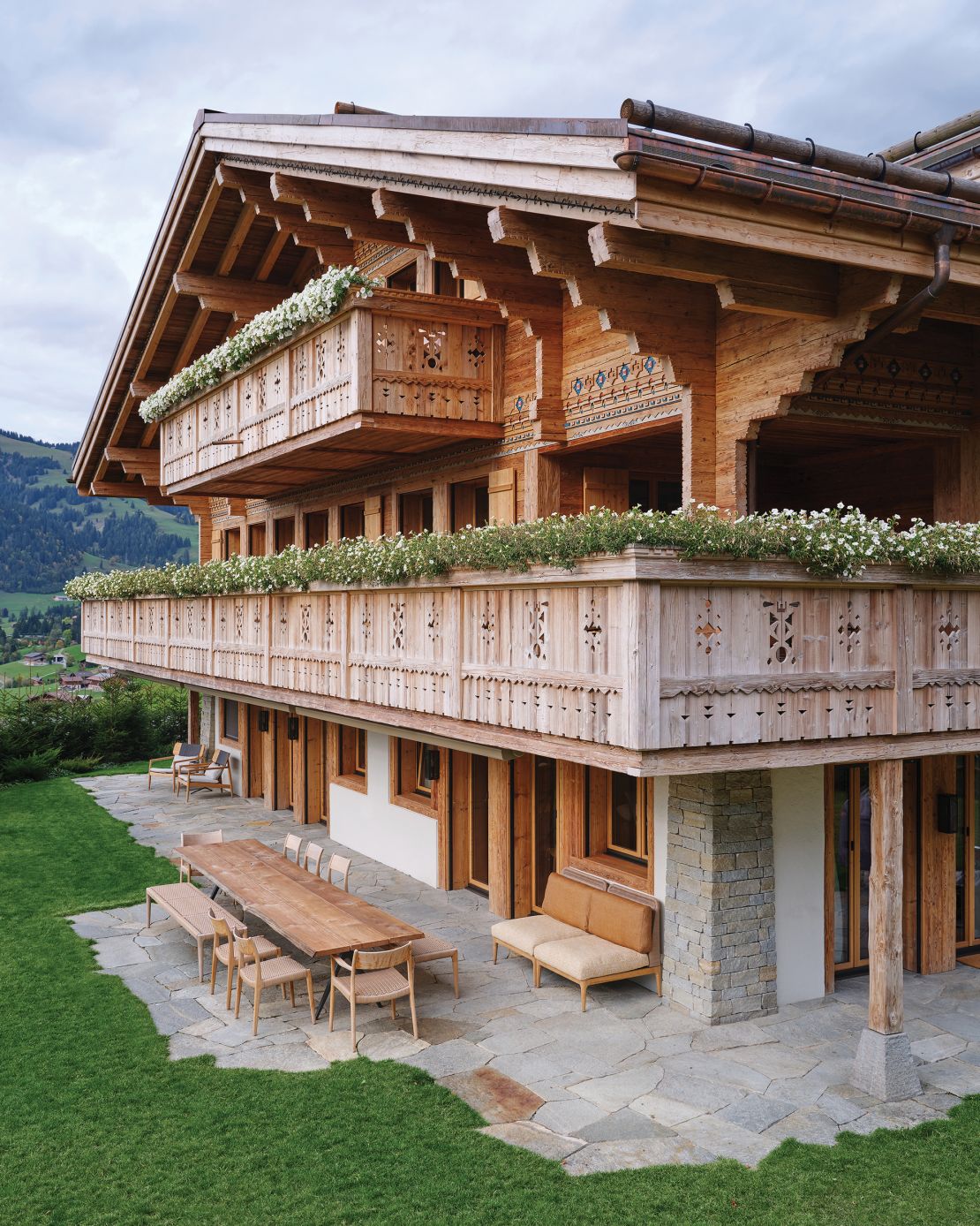 The magazine spotlights a series of chalets built in Gstaad by Francis Kéré and Sara Zewde.