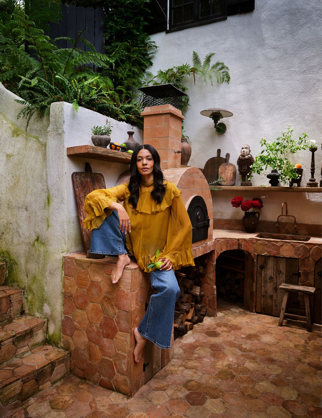 Reclaimed terracotta tiles make up James' outdoor kitchen.