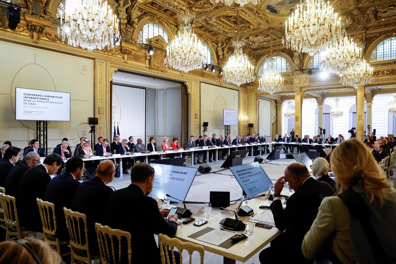 French President Emmanuel Macron, center, speaks during an international humanitarian conference for civilians in Gaza, at the Elysee Presidential Palace, in Paris, on November 9.