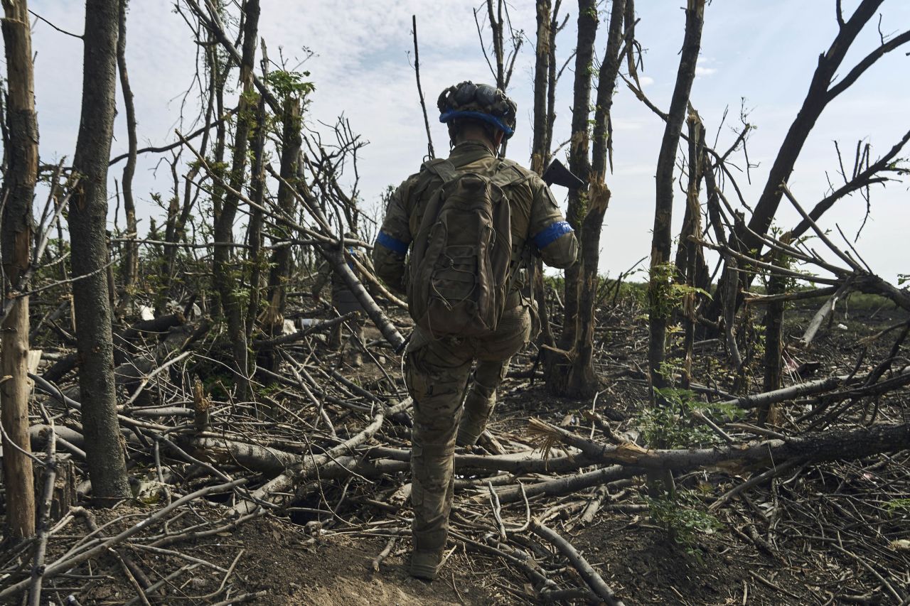 A Ukranian soldier takes up a position near Bakhmut, in Ukraine's Donetsk region, on Monday, September 4. 