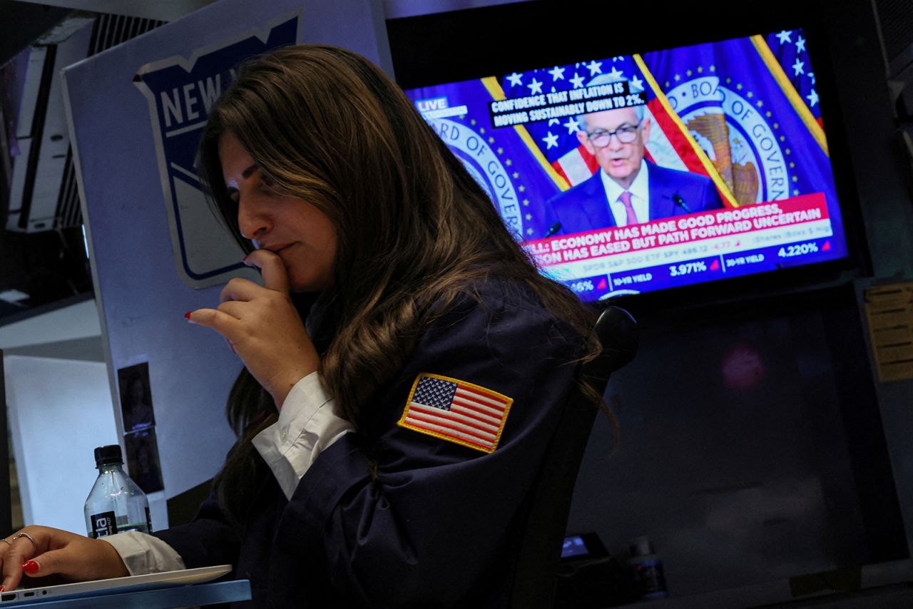 Stocks surge after Fed indicates three rate cuts still coming this year |  CNN Business