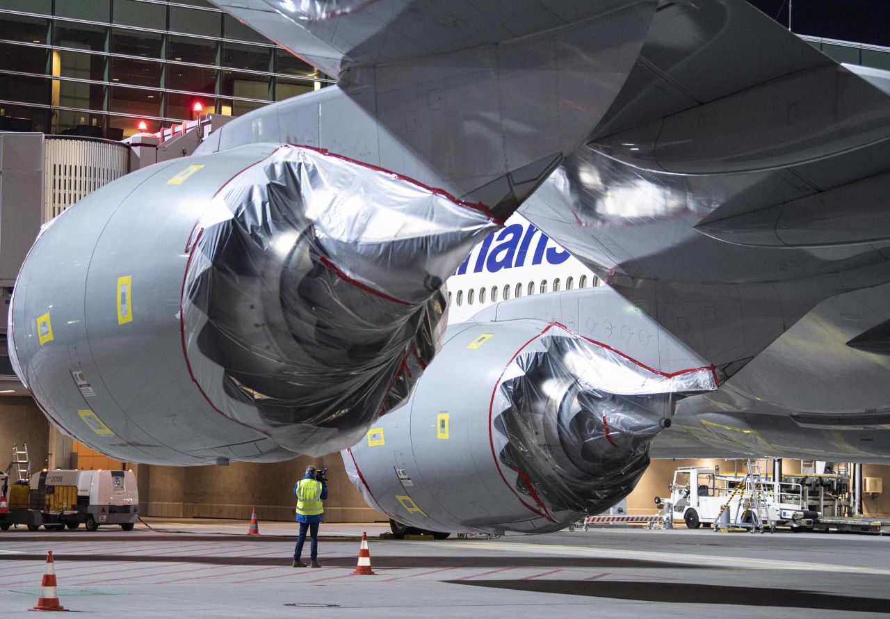 The engines of a Lufthansa Boeing 747 are seen covered with plastic film at Frankfurt Airport in Hessen, Germany on April 8, as the airline temporarily decommissions part of its fleet.