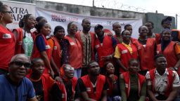 <strong>Nigerian singer Adekunle Gold poses for a photo with volunteers at the Sickle Cell Advocacy and Management Initiatives medical outreach he sponsored at Akerele Primary Healthcare Center in Surelere in Lagos. </strong>