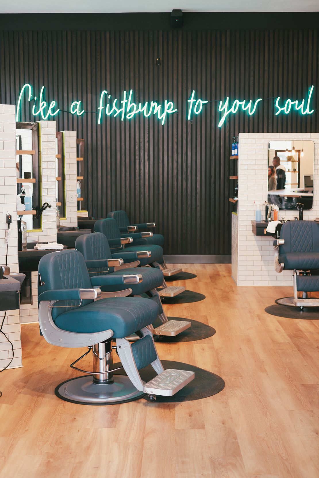 The barbershop is designed to uplift its staff and patrons.